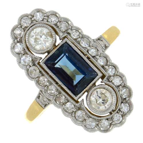 A sapphire and vari-cut diamond dress ring.Sapphire calculat...