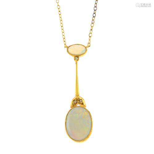 An early 20th century gold opal drop pendant,