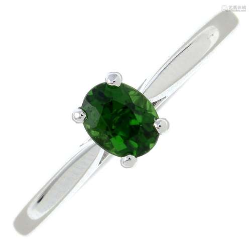 A green tourmaline single-stone ring.Tourmaline weight 0.40c...