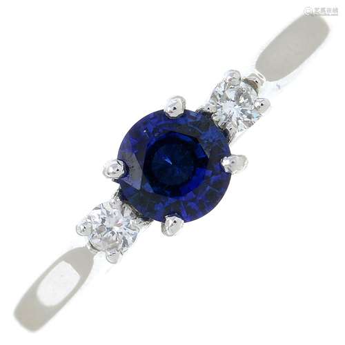 An 18ct gold sapphire and diamond three-stone ring.Sapphire ...