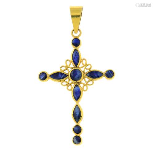 A sapphire cross pendant.Stamped 18K.