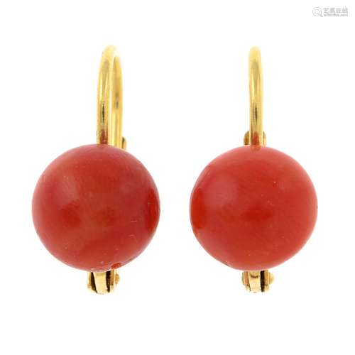 A pair of coral earrings.Stamped 750.