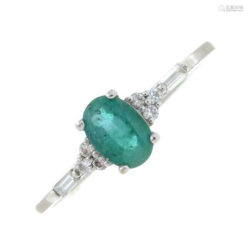 An emerald and vari-cut diamond ring.Emerald weight 0.31ct,