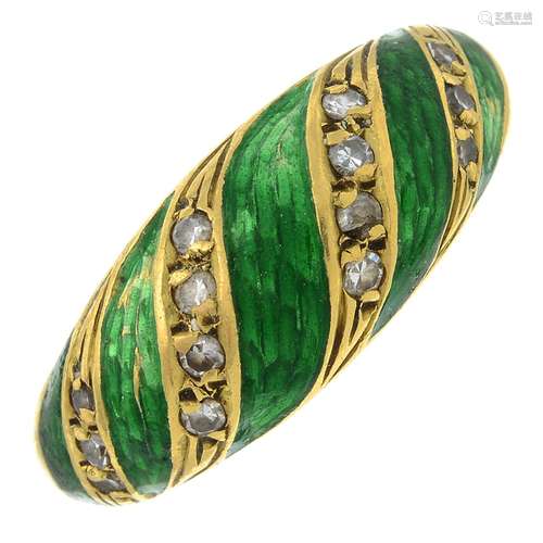 An 18ct gold diamond and green enamel dress ring.Estimated t...