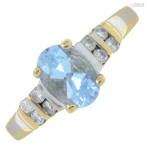 An aquamarine and colourless gem cluster ring.Stamped 750.Ri...