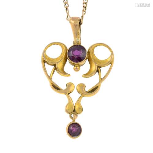 An Edwardian 9ct gold amethyst openwork pendant,