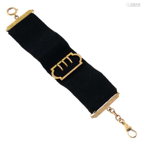 A late 19th century 9ct gold watch fob belt, with buckle mot...