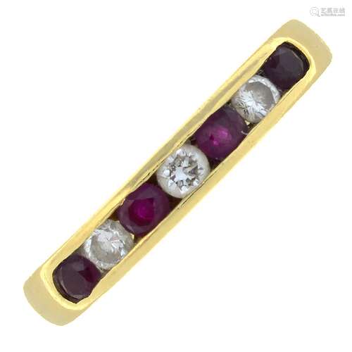 An 18ct gold ruby and brilliant-cut diamond half eternity ri...