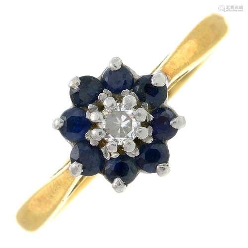 A sapphire and diamond cluster ring.Diamond estimated weight...