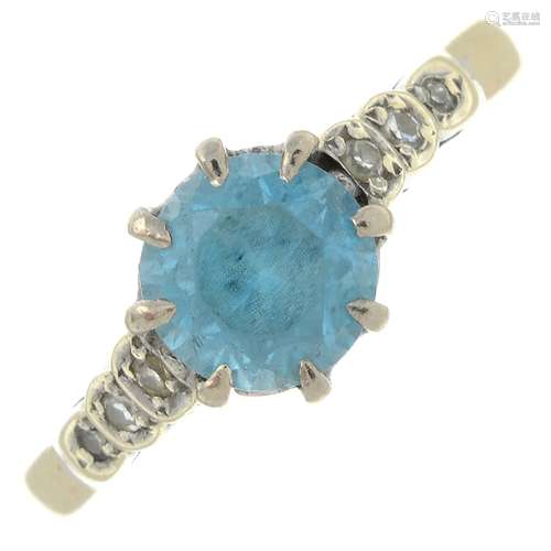 A blue zircon and diamond ring.Stamped 18C.