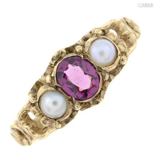 A 9ct gold garnet and split pearl three-stone ring.Hallmarks...