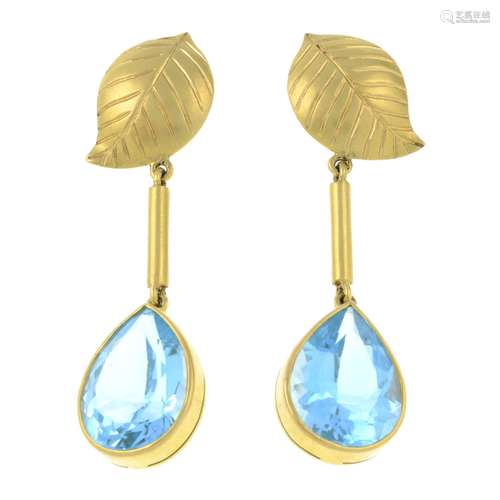 A pair of blue topaz and leaf motif drop earrings.Estimated ...