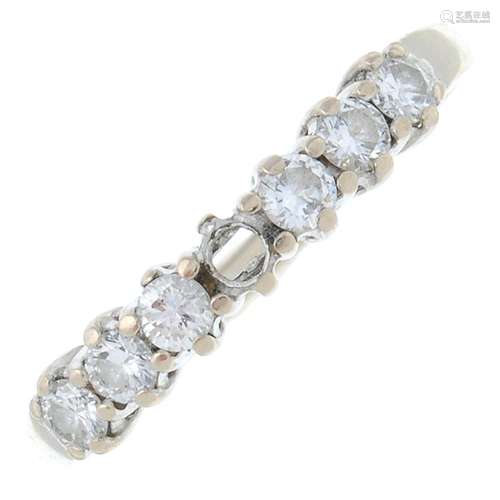 An 18ct gold brilliant-cut diamond half eternity ring.One st...