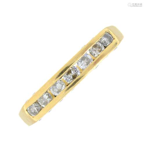 An 18ct gold brilliant-cut diamond half eternity ring.Total ...