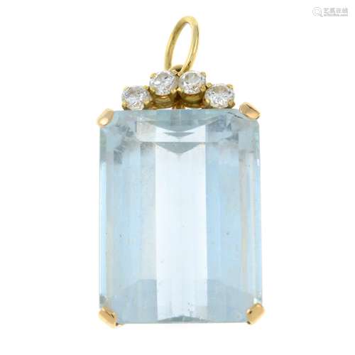 A blue topaz and brilliant-cut diamond pendant.Topaz calcula...