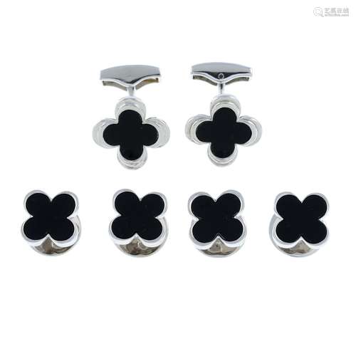 A set of onyx dress set, to include a pair of cufflinks and ...