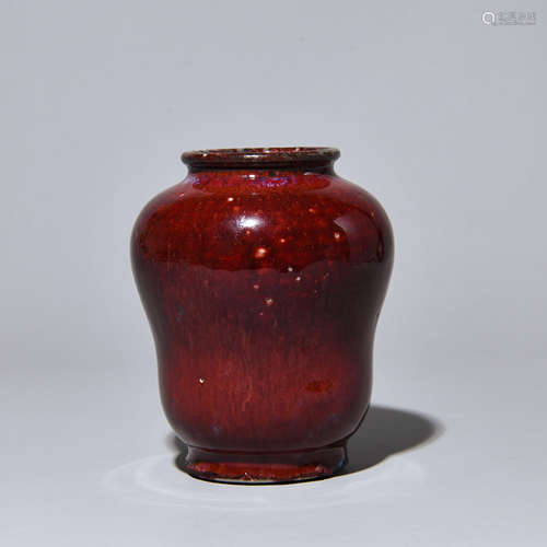 A RED GLAZE BOTTLE IN QING DYNASTY