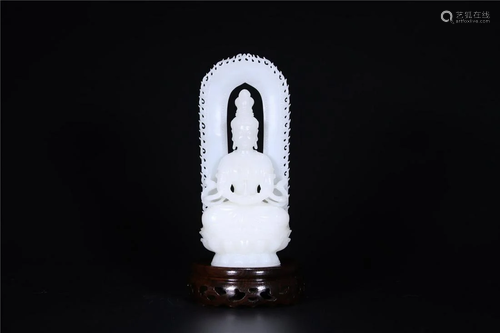 A Chinese White Jade Figure Of Guanyin