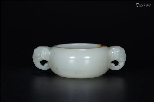 A Chinese White Jade Vase With Cover