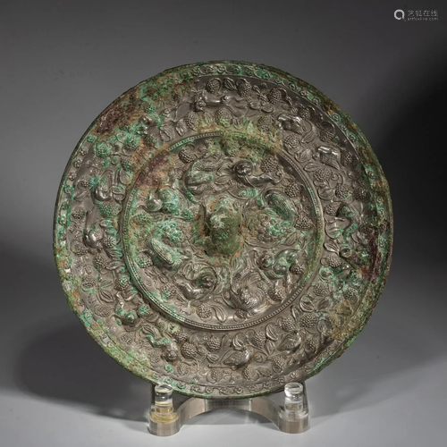 A Chinese Bronze 'Beast And Grape' Mirror,Tang Dynasty