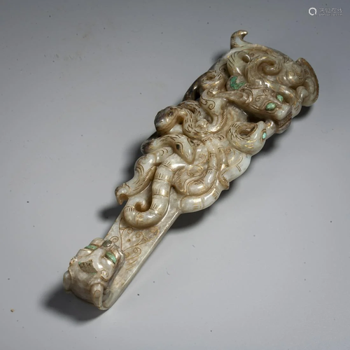 A Chinese Pale Green Jade 'Dragon' Belt Hook , Han