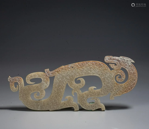 A Chinese Jade Dragon-Shaped Pendant, Spring And Autumn