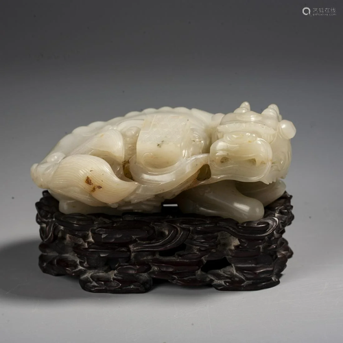 A Chinese White Jade 'Buffalo And Dragon' Group