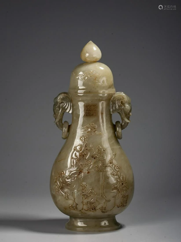 A Chinese White Jade Vase And Cover With Two Rings,