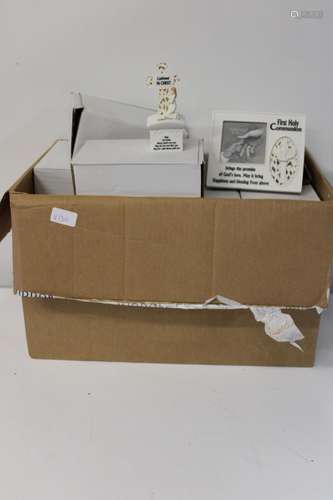 A box full of new boxed religious related ornaments 19 piece...