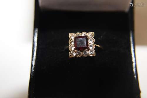 A 9ct gold garnet & white stone square set ring size N