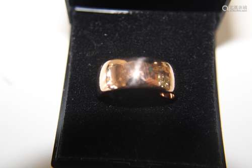 A 9ct rose gold large band ring size T