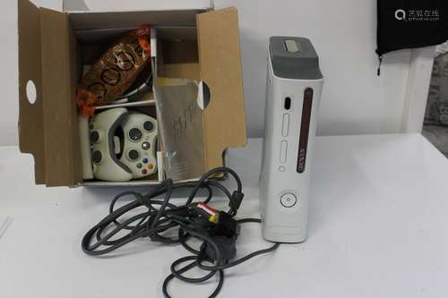 A boxed Xbox 360 & accessories (Un-tested)