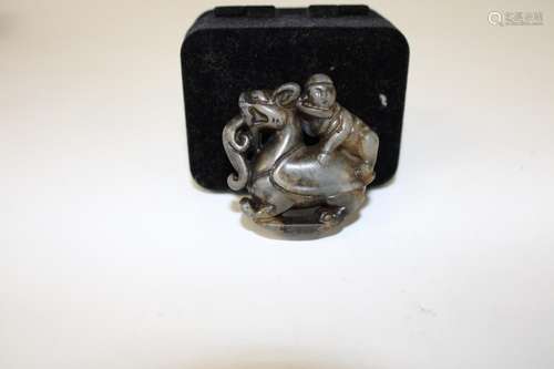 A Oriental carved jade amulet 5cm