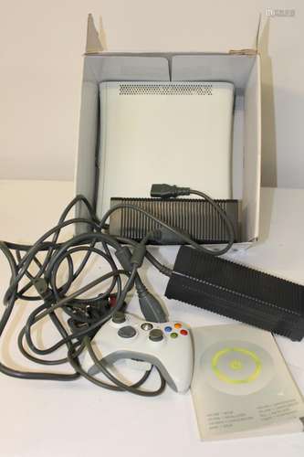 A boxed Xbox 360 & accessories (Un-tested)