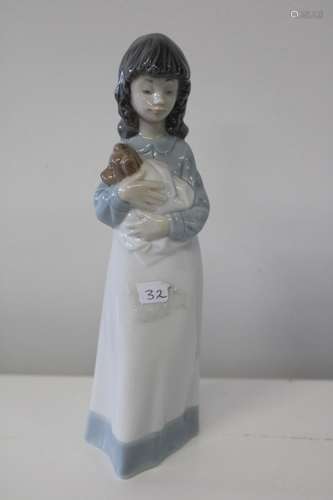 A Nao figure of a girl holding a puppy h24cm