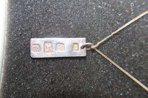 A 925 silver chain & and hallmarked silver ingot pendant