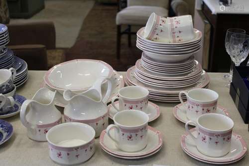 A large Royal Doulton calico red dinner service (factory sec...