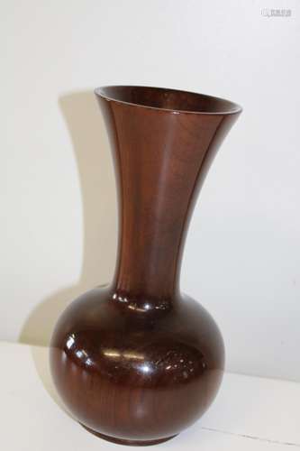 A Chinese trumpet vase made from hard wood h22cm