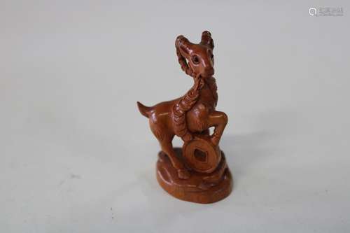 A Chinese box wood netsuke