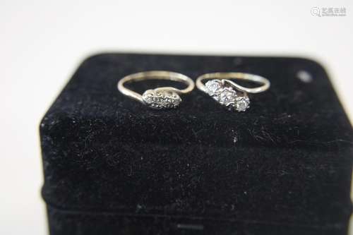 A 9ct gold & platinum ring with three diamonds 2 grams An 18...