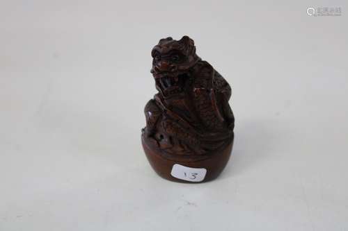 A Chinese box wood netsuke