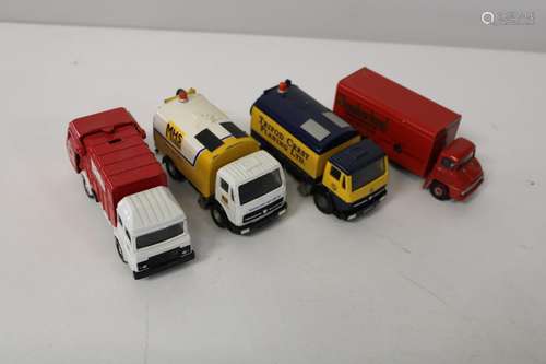 Four Corgi truck models