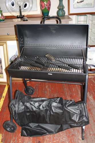 A barely used charcoal BBQ & utensils Collection Only