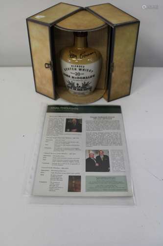 A cased & unopened bottle of John McDonalds blended twenty y...