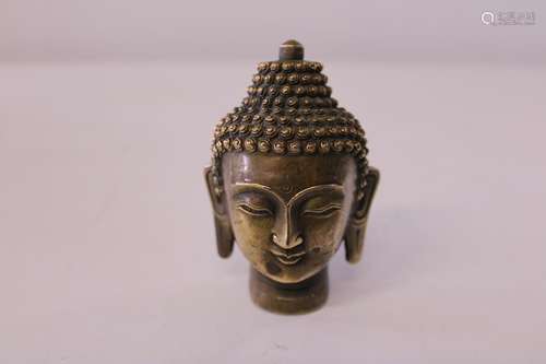 A bronze Budha head 10cm tall