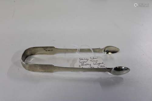 A set of large Georgian hallmarked silver sugar tongs. Newca...