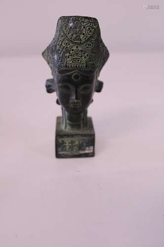 A cast metal Oriental seal