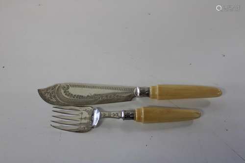 A set of antique bone handled servers (Sold as seen)