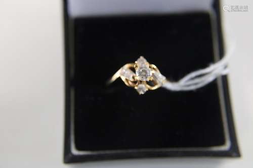 A 9ct gold fancy dress ring with clear stones