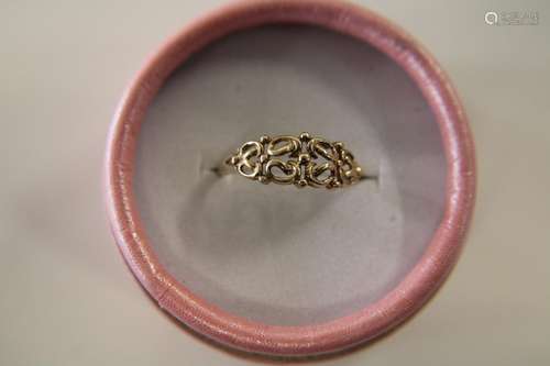 A 9ct gold ornate patterned ring size Q